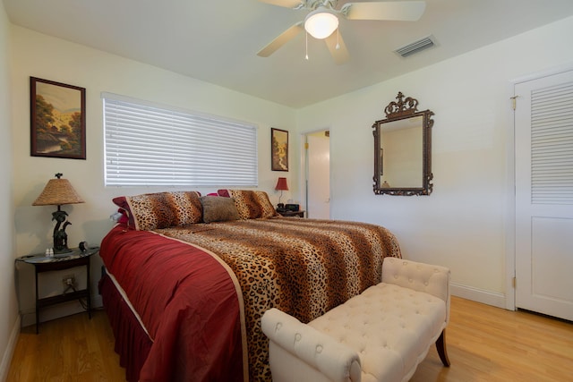 1503 Shirley Ct, Lake Worth, FL 33461 - bedroom with light wood finished floors, baseboards, and ceiling fan