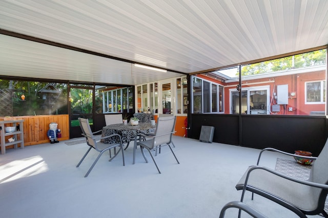 1503 Shirley Ct, Lake Worth, FL 33461 - sunroom featuring outdoor dining area and healthy amount of natural light