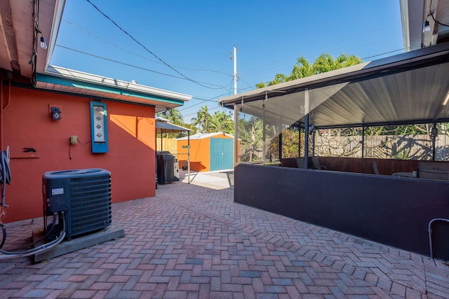 1503 Shirley Ct, Lake Worth, FL 33461 - view of patio / terrace featuring cooling unit