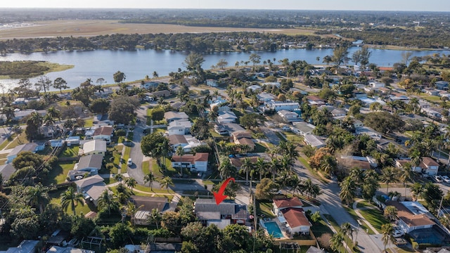 drone / aerial view with a water view