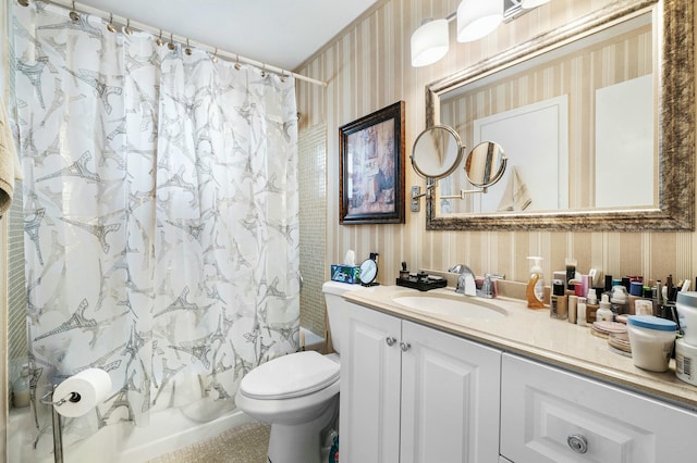 full bathroom with shower / bath combo with shower curtain, vanity, and toilet