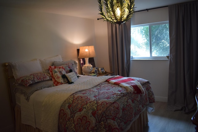 bedroom featuring hardwood / wood-style floors