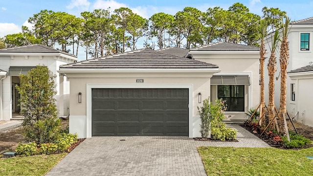 view of front of property featuring a garage