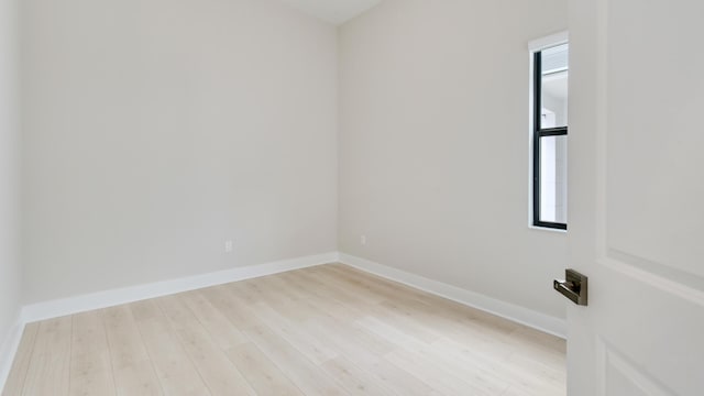 unfurnished room featuring light hardwood / wood-style floors