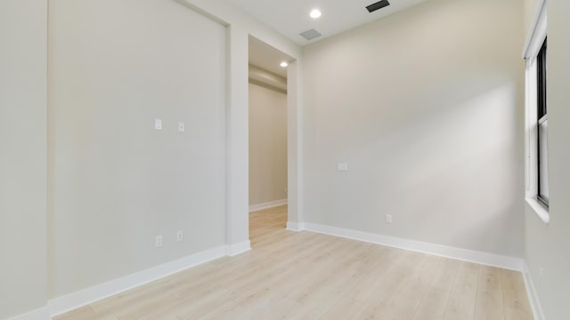 spare room with light wood-type flooring