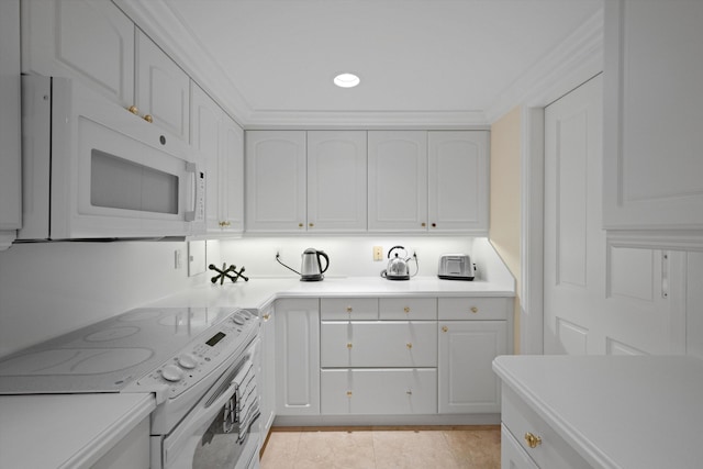 kitchen featuring white cabinets, light tile patterned floors, electric range, and crown molding