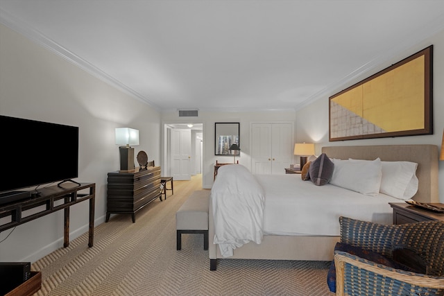 bedroom featuring carpet floors and crown molding