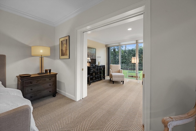 bedroom with light colored carpet, expansive windows, and ornamental molding