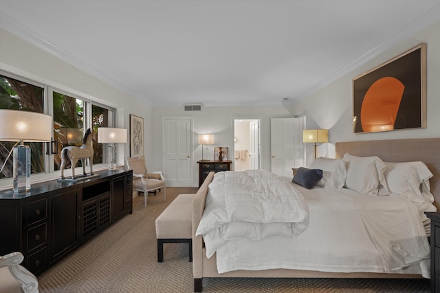 bedroom with crown molding