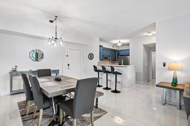 dining room with baseboards