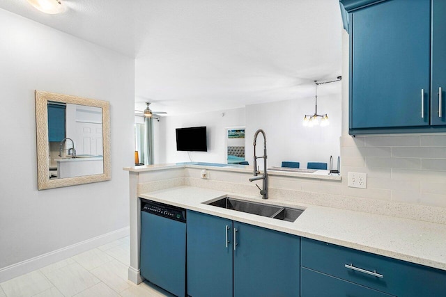 kitchen with tasteful backsplash, dishwashing machine, open floor plan, blue cabinets, and a sink