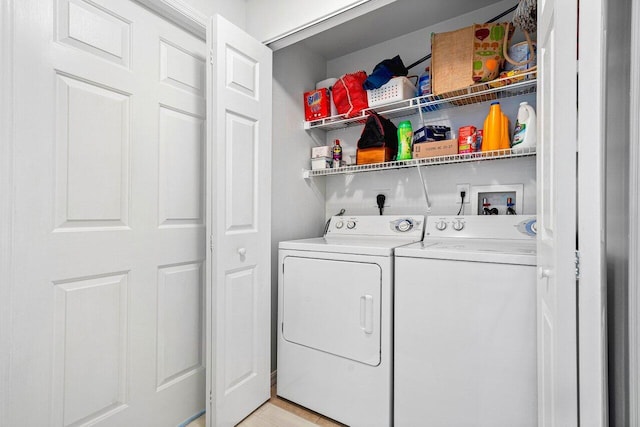 laundry room with laundry area and separate washer and dryer