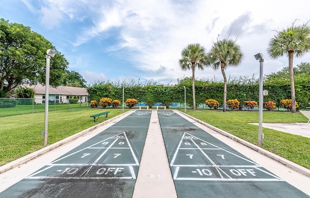 view of community with a lawn