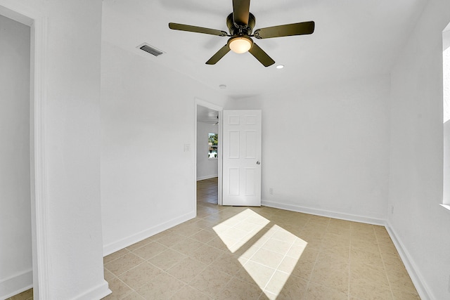 unfurnished room featuring ceiling fan