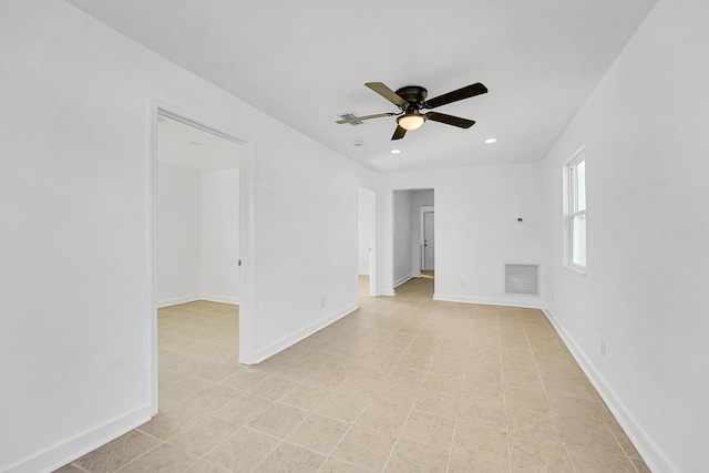 spare room featuring ceiling fan