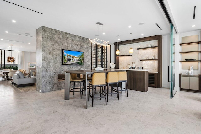 bar with pendant lighting, indoor bar, visible vents, and recessed lighting