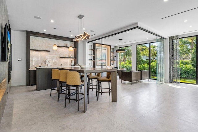 dining space with recessed lighting