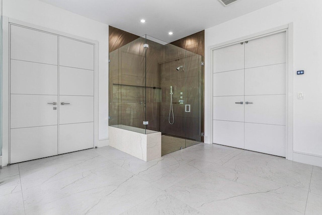 full bathroom with marble finish floor, a shower stall, a bath, and recessed lighting