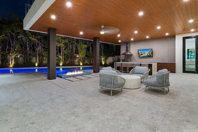 view of patio / terrace featuring an outdoor pool