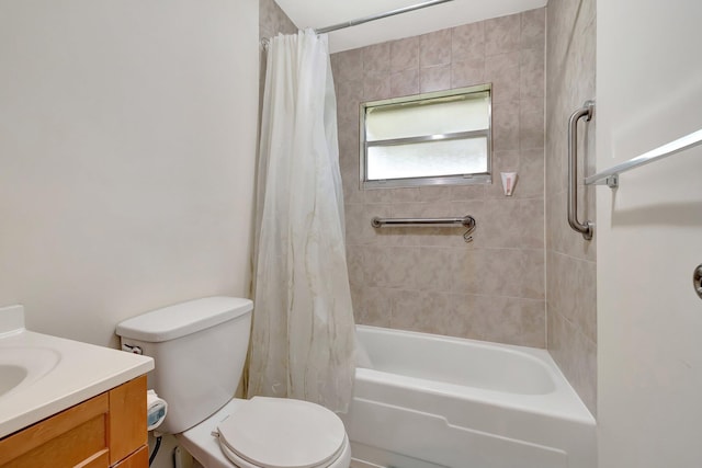 full bathroom featuring vanity, toilet, and shower / tub combo with curtain