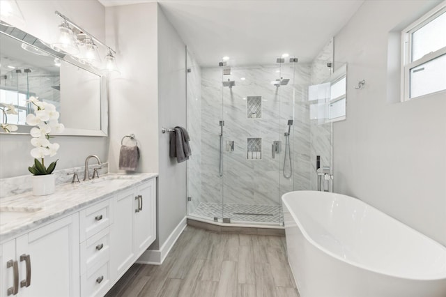 bathroom with plus walk in shower and vanity