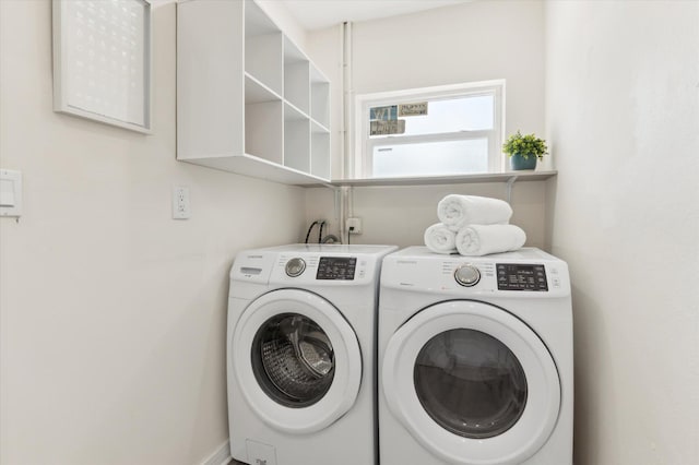 laundry area featuring separate washer and dryer