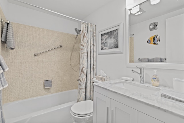 full bathroom with vanity, shower / bath combination with curtain, and toilet