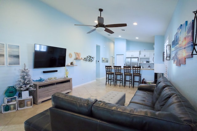 living room with light tile patterned floors, high vaulted ceiling, and ceiling fan