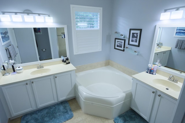 bathroom featuring separate shower and tub, tile patterned flooring, and vanity