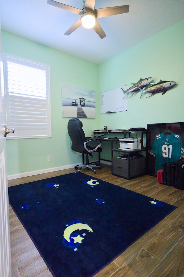 home office featuring ceiling fan and wood-type flooring