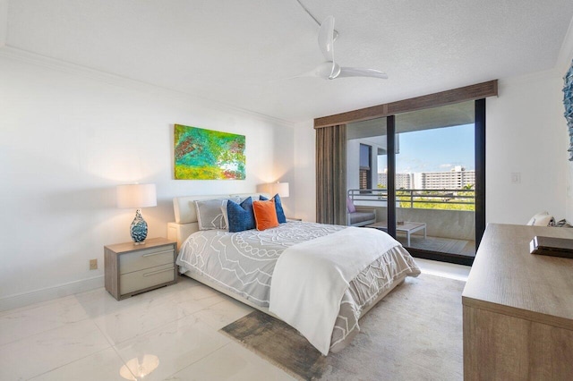 bedroom featuring a textured ceiling and ceiling fan