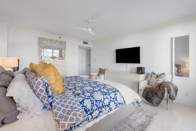 bedroom with ceiling fan and ornamental molding