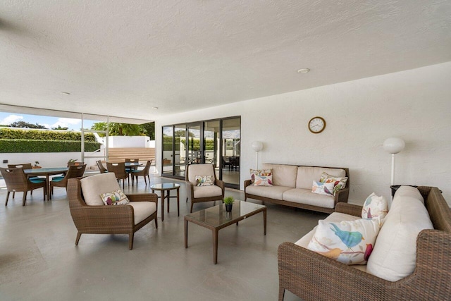 living room with concrete flooring