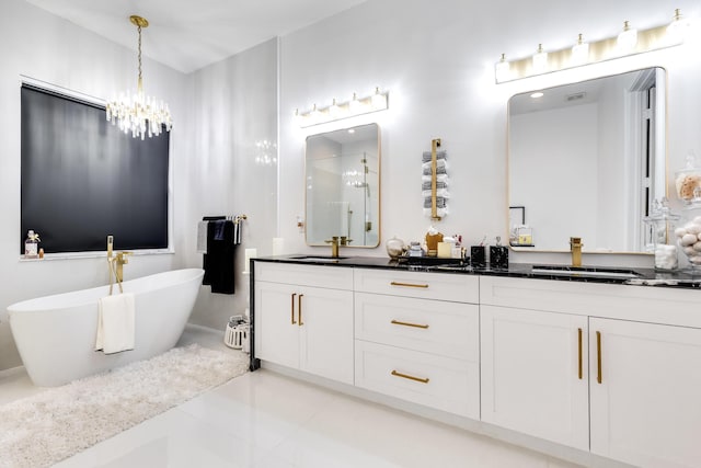 bathroom featuring vanity, tile patterned floors, independent shower and bath, and a notable chandelier