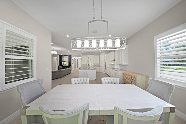 dining room featuring sink