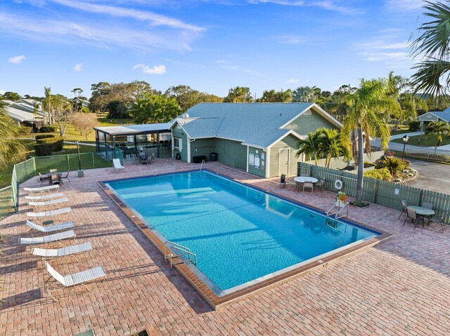 view of pool featuring a patio area