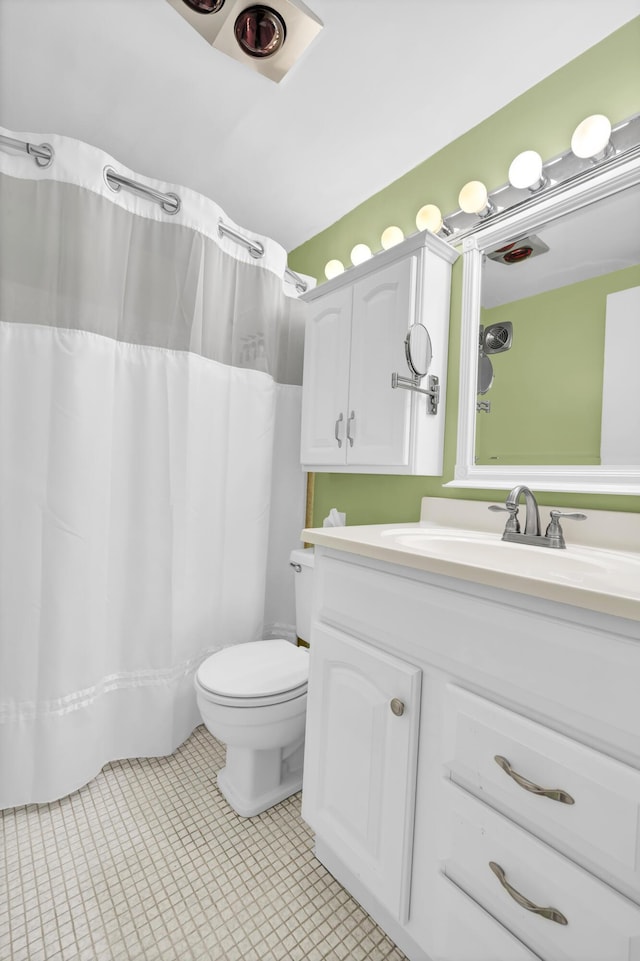 bathroom with tile patterned floors, vanity, toilet, and a shower with shower curtain