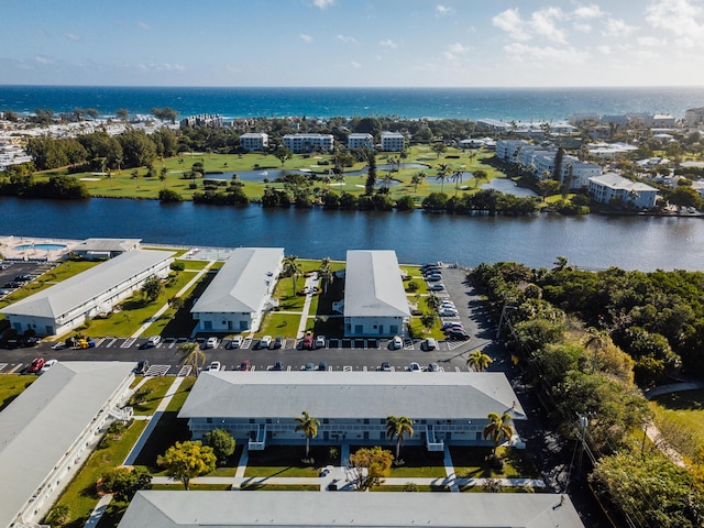 bird's eye view with a water view