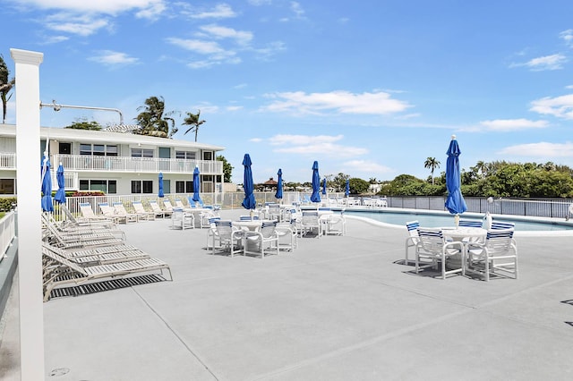 view of swimming pool featuring a patio area