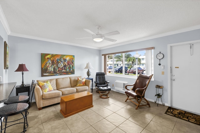 tiled living room featuring a textured ceiling, an AC wall unit, ceiling fan, and crown molding