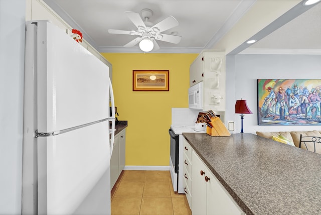 kitchen featuring white cabinets, white appliances, and crown molding