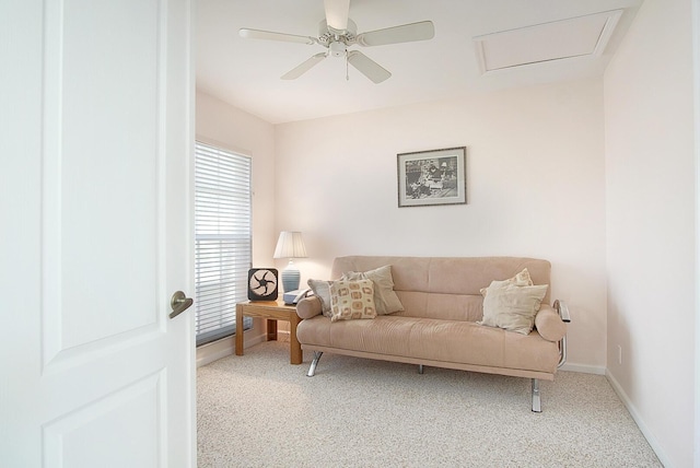 living room featuring ceiling fan and carpet floors