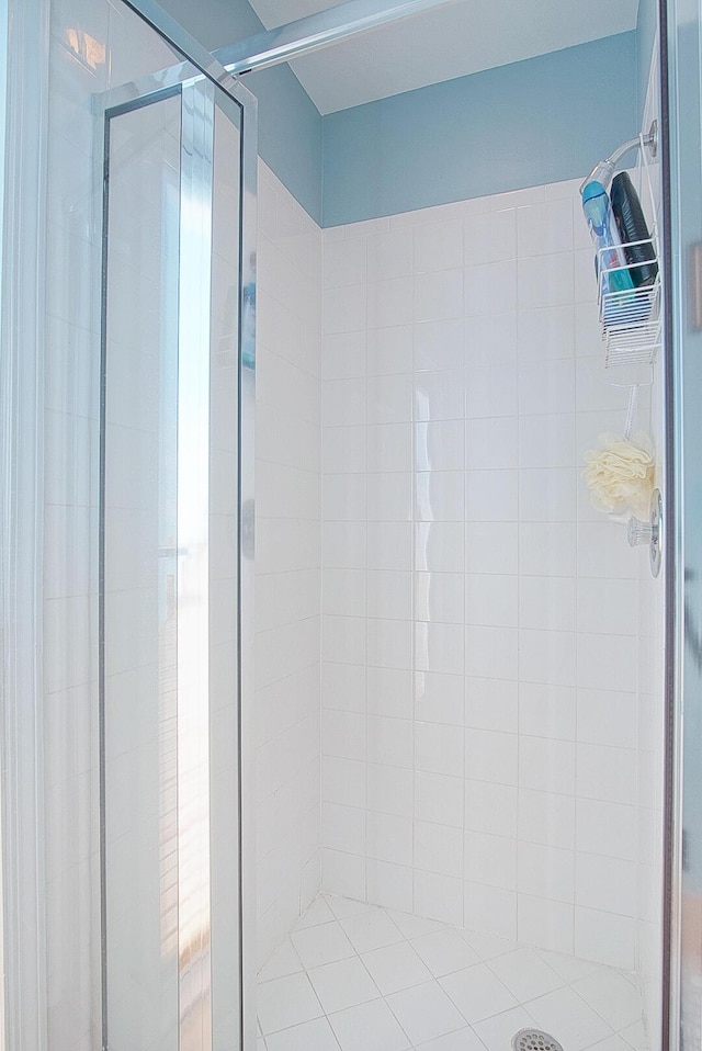 bathroom featuring an enclosed shower