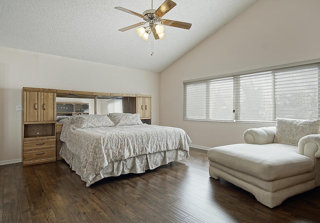 bedroom with lofted ceiling, ceiling fan, dark wood-type flooring, and a textured ceiling