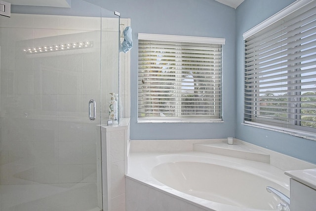 bathroom featuring plus walk in shower