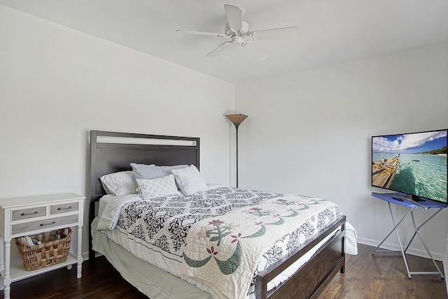 bedroom with ceiling fan and dark wood-type flooring