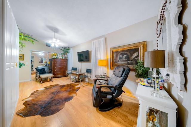 bedroom with ceiling fan and wood-type flooring