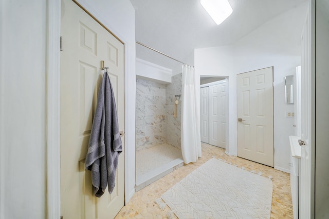 bathroom with a stall shower