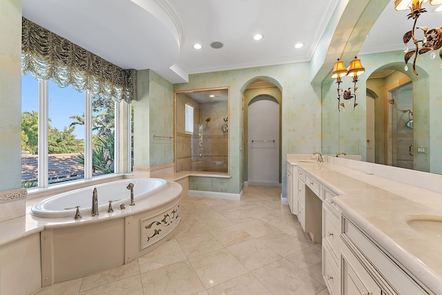 bathroom featuring shower with separate bathtub, vanity, and crown molding