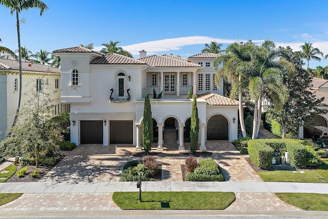 mediterranean / spanish-style home featuring french doors